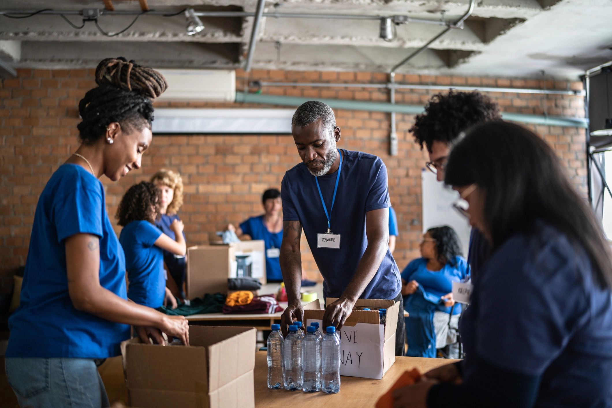 Volunteers working together in a community setting
