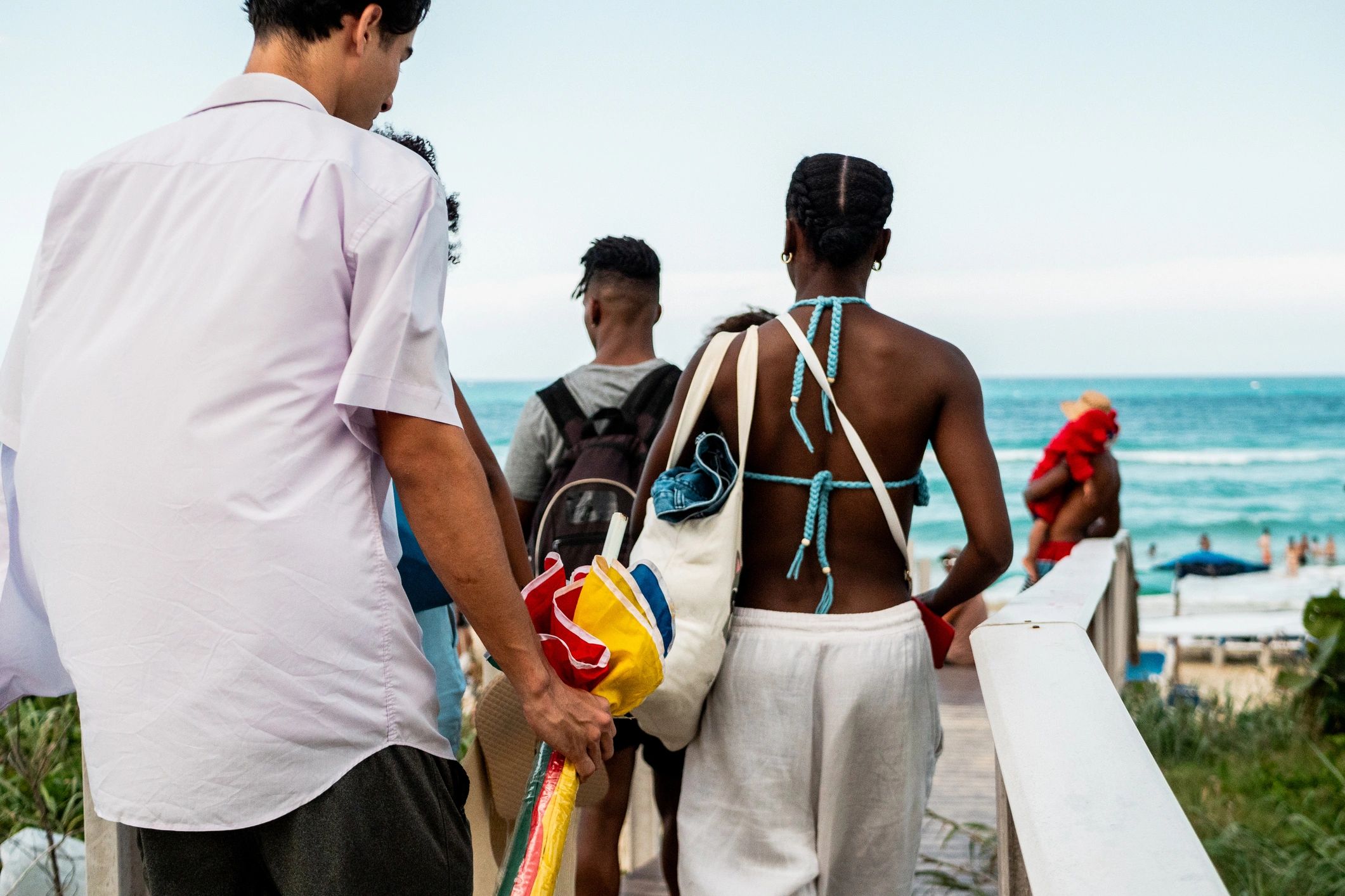 Friends arriving at a beach destination