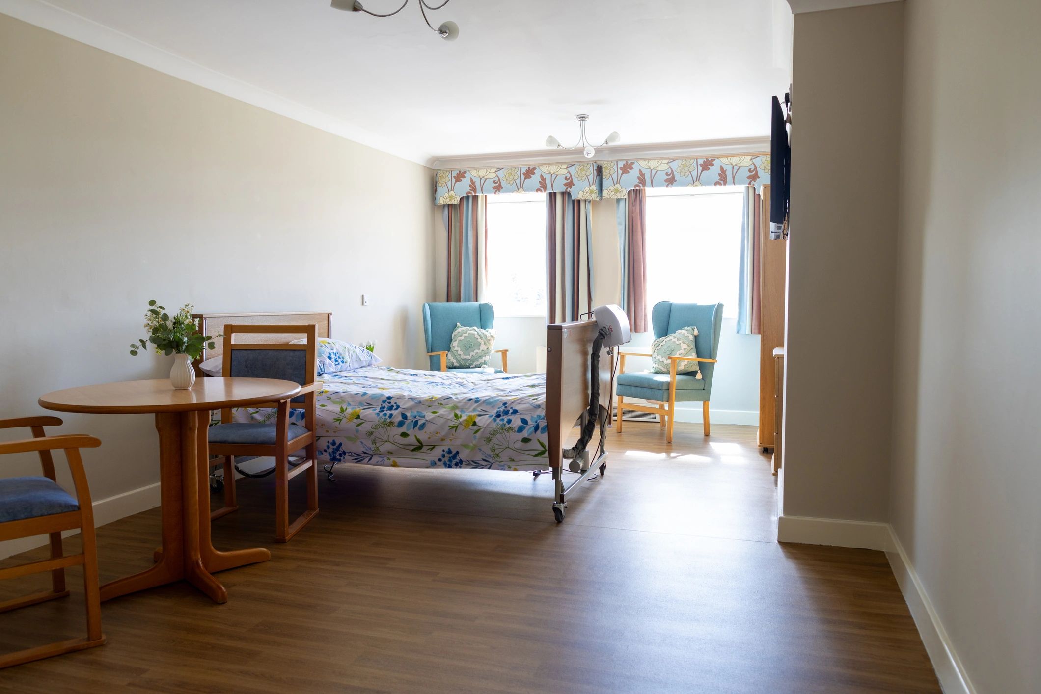 Simple, clean guest room interior representing restful accommodation